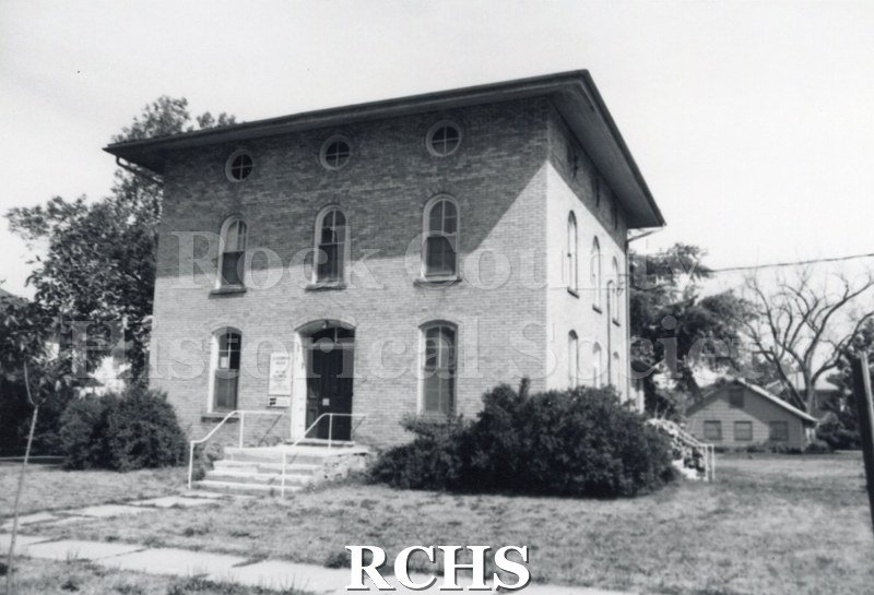 Black and white photograph of the Ezra Goodrich House, a three story building, probably in Milton.