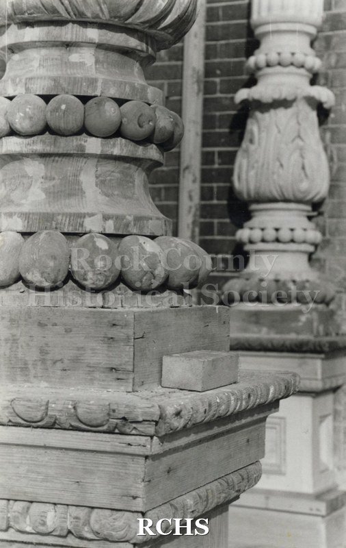 Black and white photograph of a close-up of the pillars at the Tallman House. On bottom: "Paint striping".