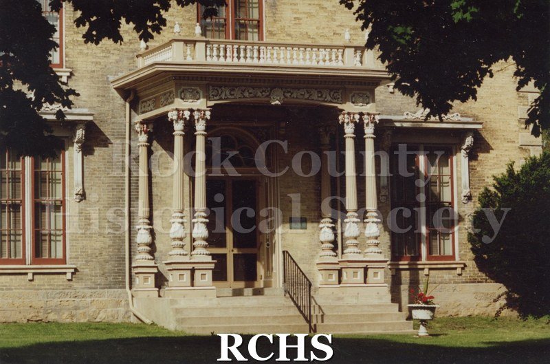 Color photo of the Tallman House porch.