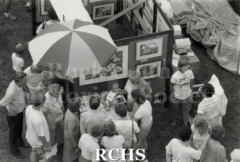 Black and white photograph of an overhead view of Connie Gowacki's booth at the Tallman House Art Festival.