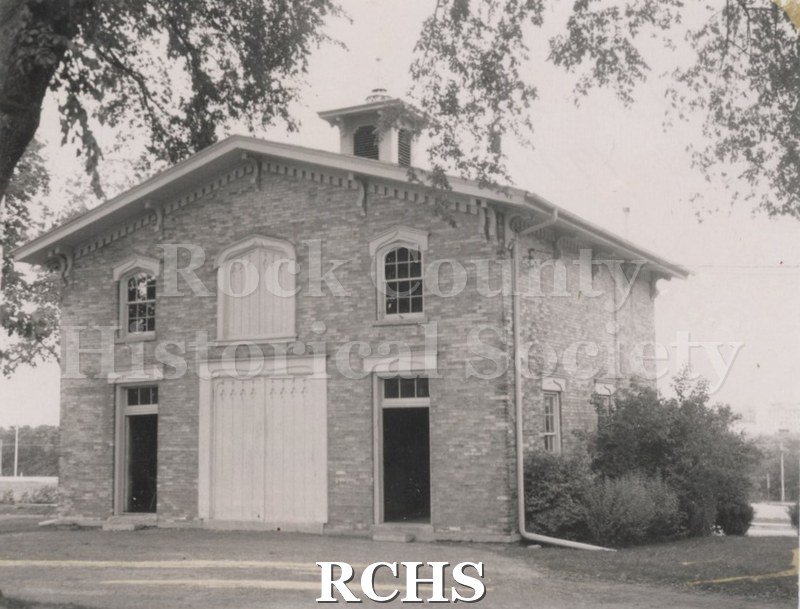 Black and white photograph of the Carriage House.