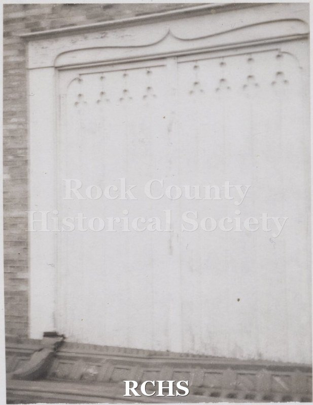 Black and white photograph of the Carriage House doors.