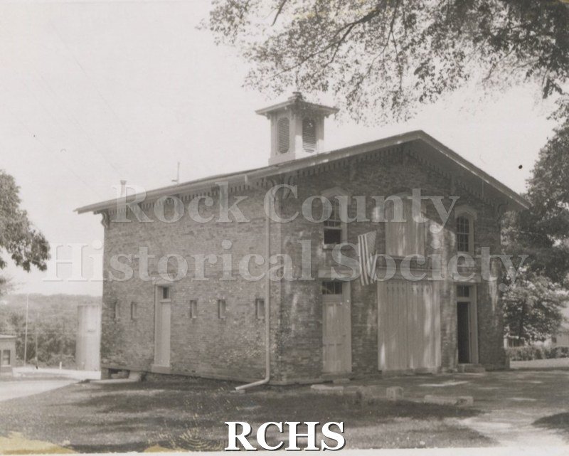 Black and white photograph of the Carriage House.