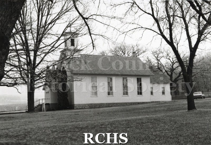 Black and white photograph of Luther Valley Lutheran Church, Spring Valley, a rural church with a belltower.