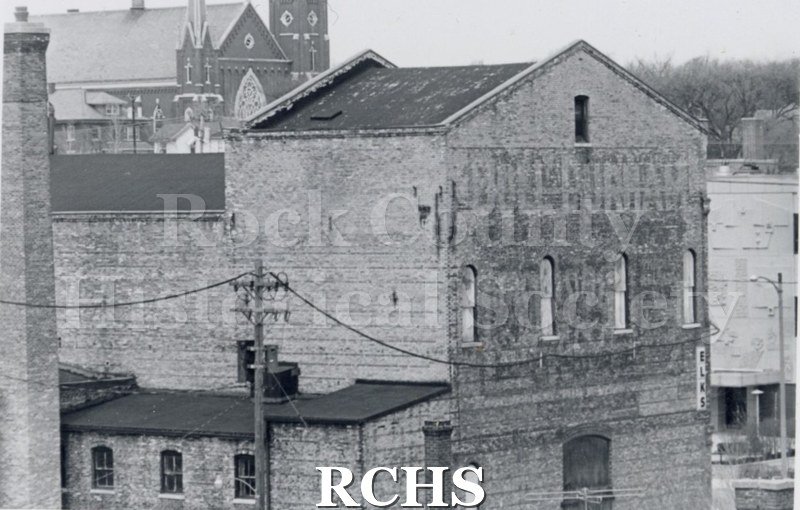 Black and white photograph of the back of the Myers Opera house.