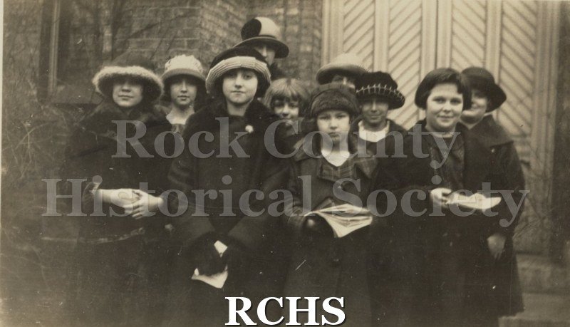 Black and white photograph of Fenno Drake's First Baptist Church Sunday School Class. Shows ten young girls standing in front of the 1st Baptist church.