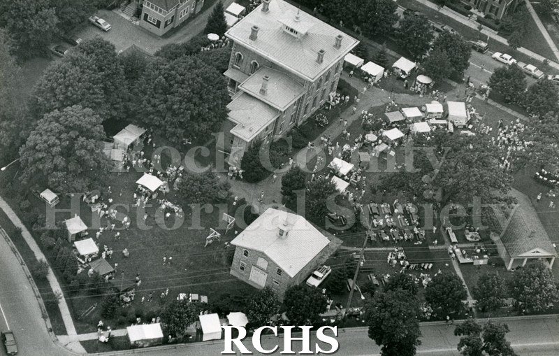 Black and white photograph of the Tallman House grounds during the arts festival.