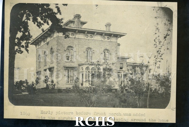 Historic image of Black and white copy print of the Tallman House. On bottom: "Early picture before front porch was added.