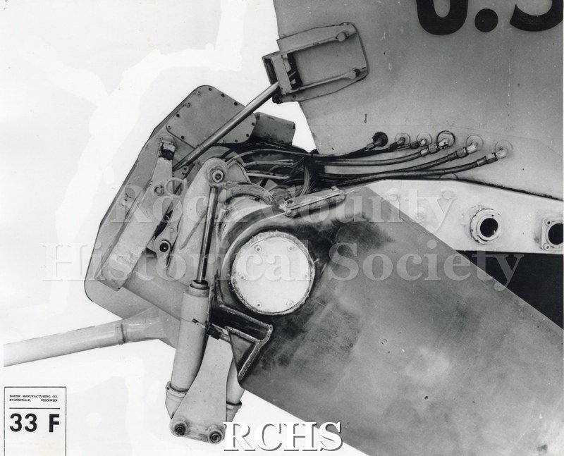 Black and white photograph of a close-up view of joint. On bottom: Baker Manufacturing Co.