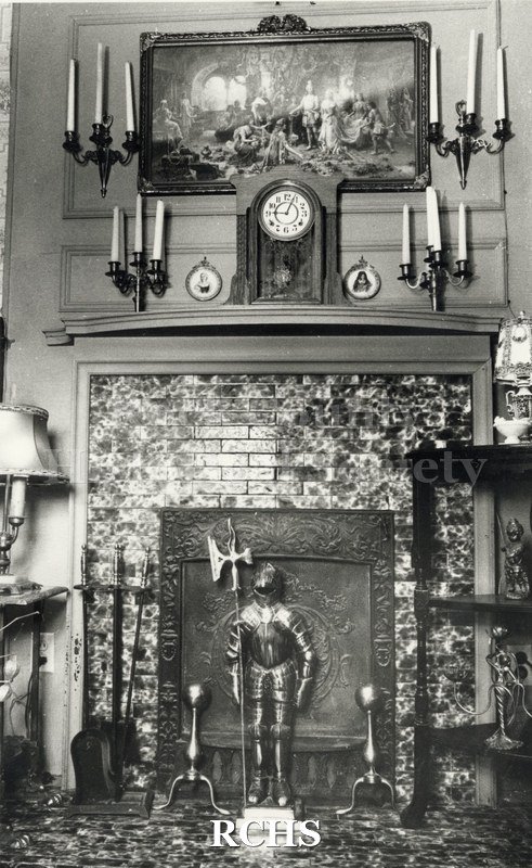 Black and white photograph of 115 S. High St., Janesville, WI. Shows the entry way of a house.
