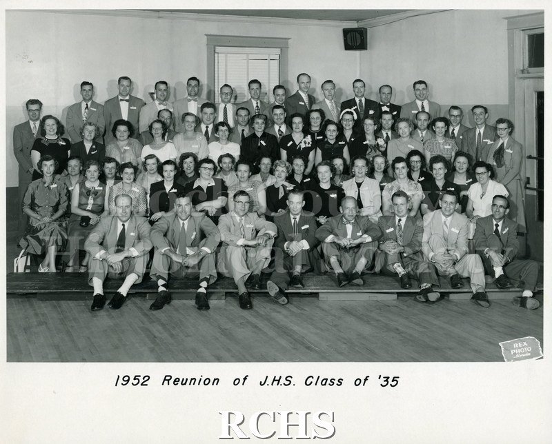 Black and white photograph of the 1952 reunion of the Janesville High School Class of 1935.