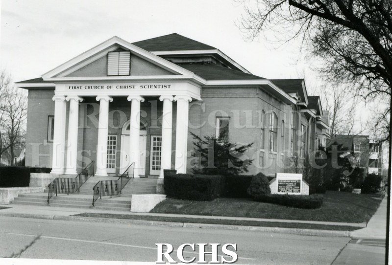 Black and white photograph of the exterior of First Church of Christ Scientist. Shows the pillared porch.