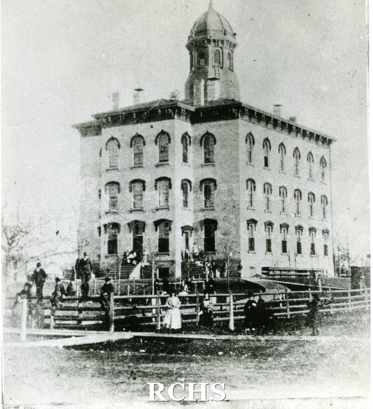 Black and white photograph copy print of Janesville High School-Jefferson School, a three story building with a cupola on top.