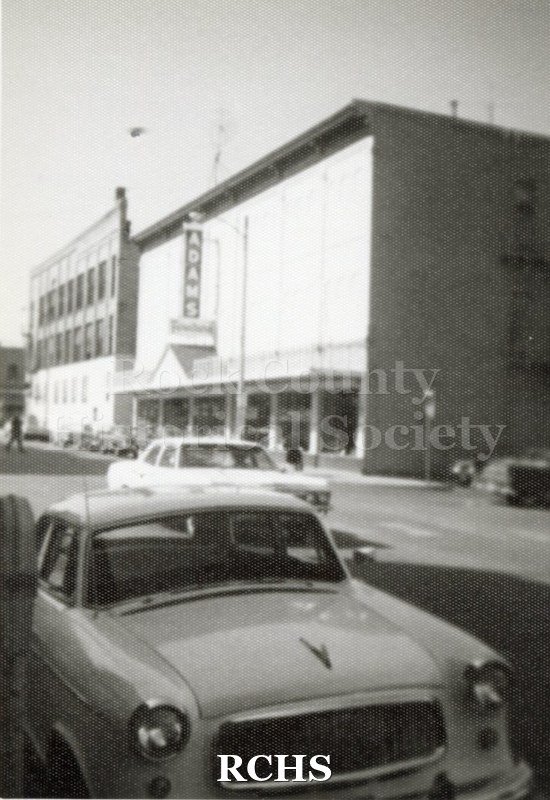 Black and white photograph of 17 S. River St., Janesville, WI. Shows two buildings in downtown Janesville, WI.