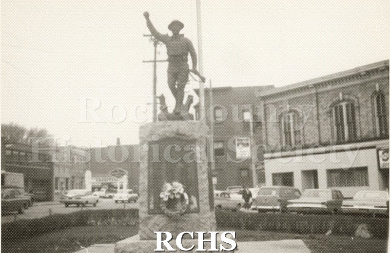 Black and white photograph of the statue in Corn Exchange Square.