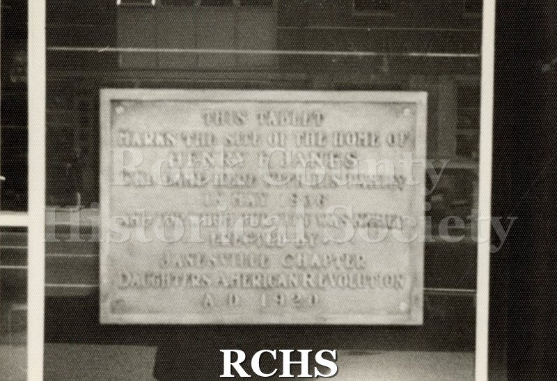 Black and white photograph of the Henry Janes plaque: "This tablet marks the site of the home of Henry F.