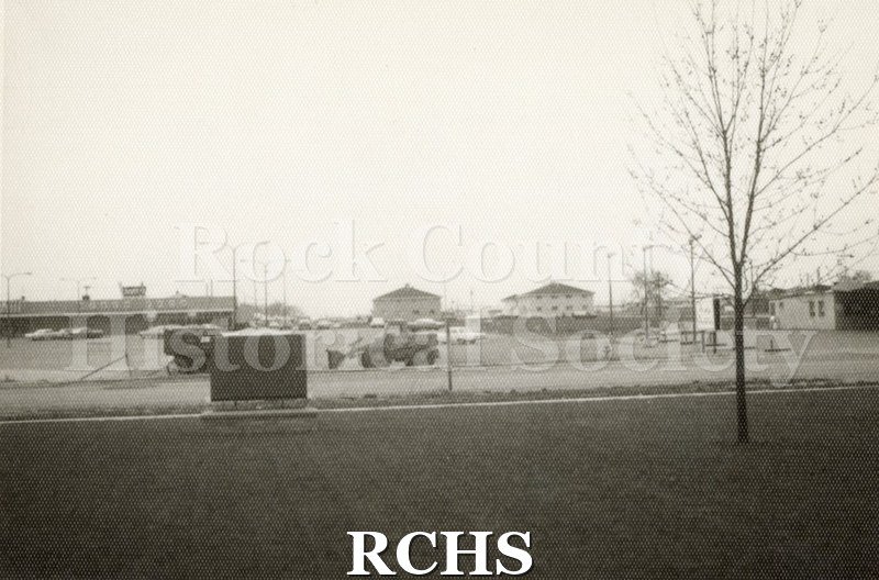 Black and white photograph of the Blackhawk Shopping Center, Janesville, WI, from a distance.