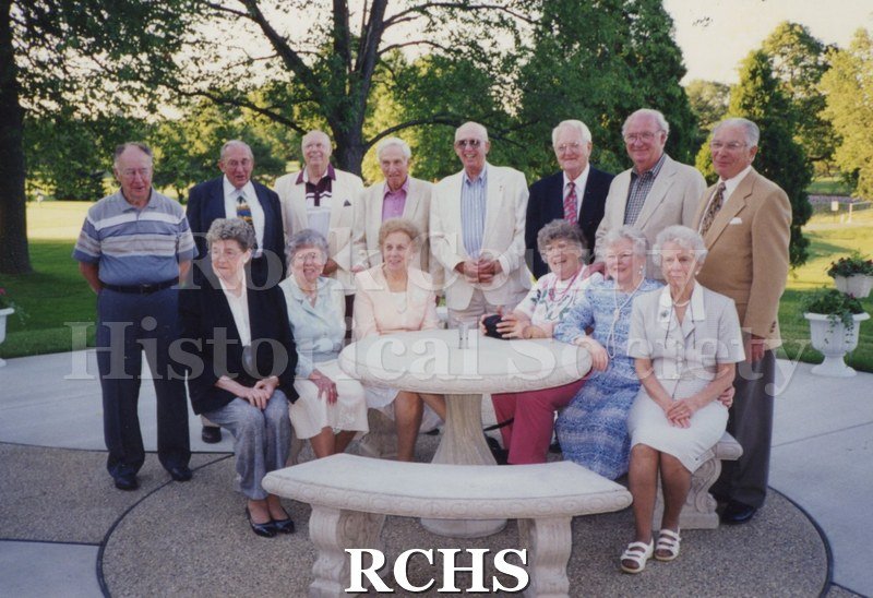 Color photo of the Class of 1938 Milton Union High School 60th year reunion. Shows 6 women and 8 men in outdoor setting.