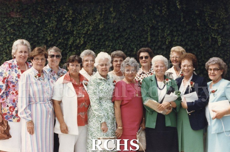 Color photo of Mercy Hospital Class of 1941 50th Reunion. Shows 13 women.