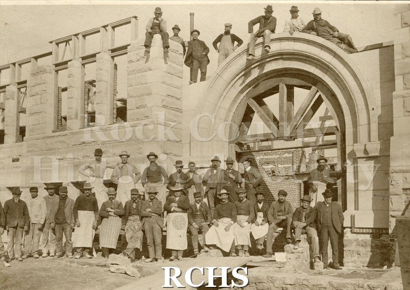 Black and white photograph of the Janesville City Hall 1902. Building in progress.