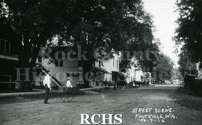 Historic image of Black and white copy print of a street in Footville.