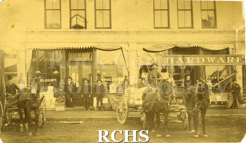 Historic image of Sepia phhotograph of the Norcross Block, corner of Dodge and S. River Street: Blount Grocery Store (2).