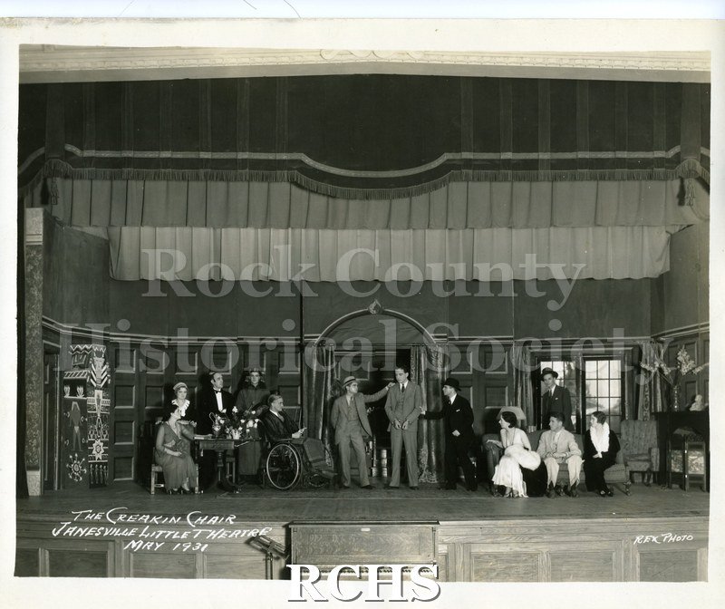 Black and white photograph of a scene from the Janesville Little Theatre's 1931 production of "The Creaking Chair." Notation on lower left corner of photo: "THE.