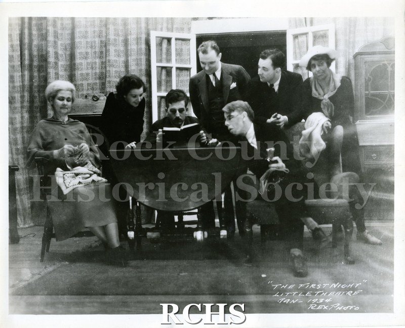 Black and white photograph of the cast of Janesville Little Theatre's 1934 production of "The First Night." Notation on right lower corner of photo: "THE FIRST.