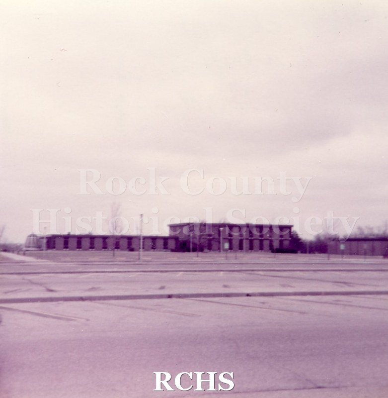 Historic image of Pinkish photogrpah of Blackhawk Tech Hyatt Andrews Hall. Transcription.