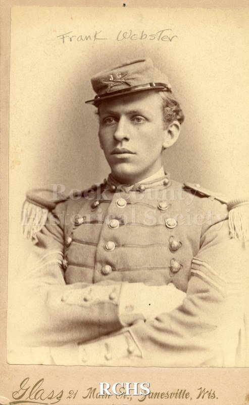 Historic image of Cabiet Card. Frank Webster. Man in military uniform. Medium color with buttons down center front, braid trim each tie to another row of buttons.
