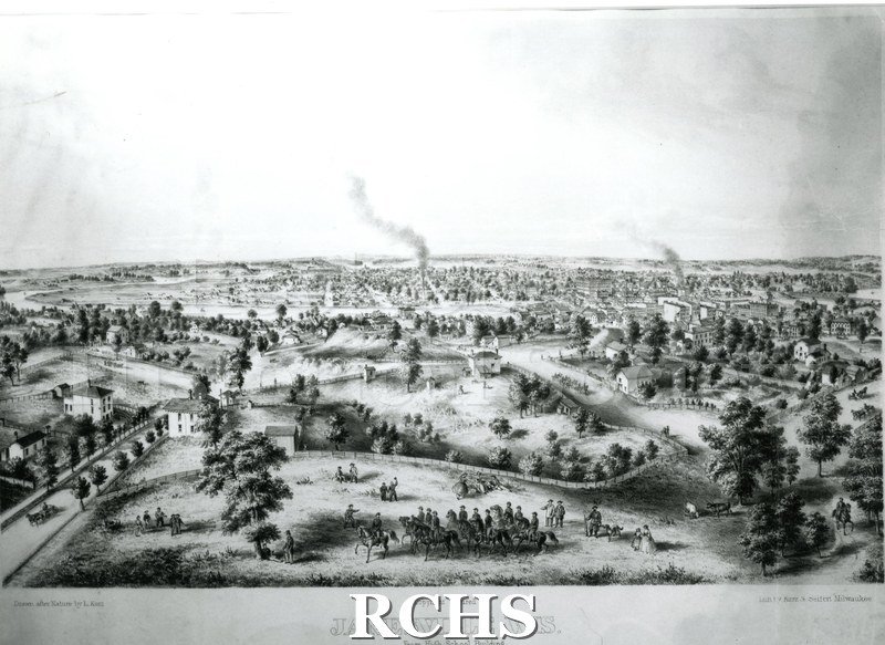 Historic image of Black and white copy print of early Janesville. On bottom: "Copy right secured Janesville, Wis. From High School Building".
