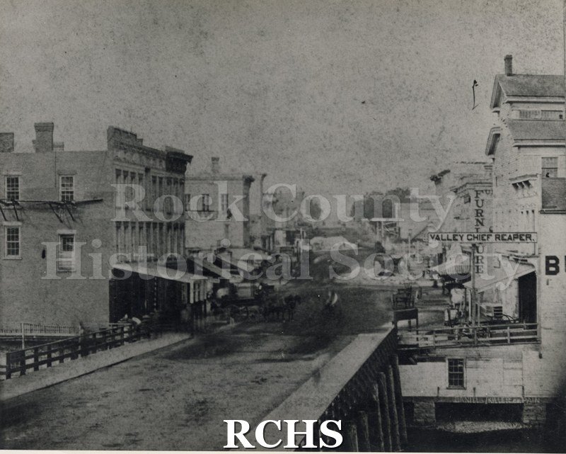Historic image of Black and white copy print of Early Janesvillle, possibly looking down Milwaukee Street.