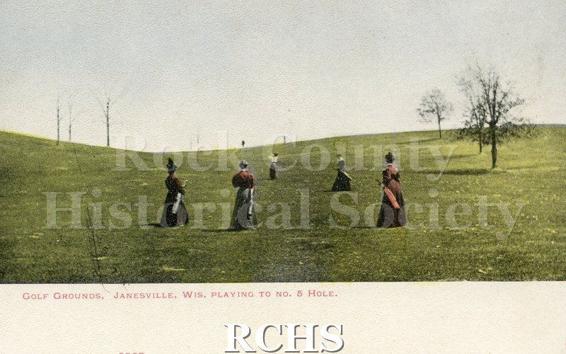 Postcard depicting five women playing golf. Caption reads: "Golf Grounds, Janesville, Wis. Playing to No. 5 Hole.".