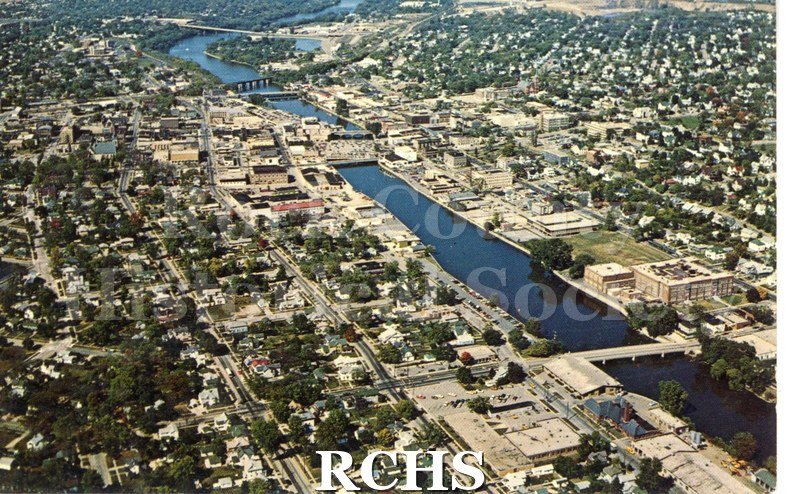 3 1/2 x 5 1/2". Front has picture of Rock River flowing through Janesville, WI. Ariel view. Sunny day. Green trees.