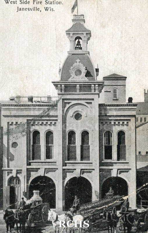 Postcard of West Side Fire Station. Black and white with wagons in foreground. Reverse addressed to "Miss Jessie4 McGregor/ R.F.T. No. 2./ Janesville,/ Wis.".