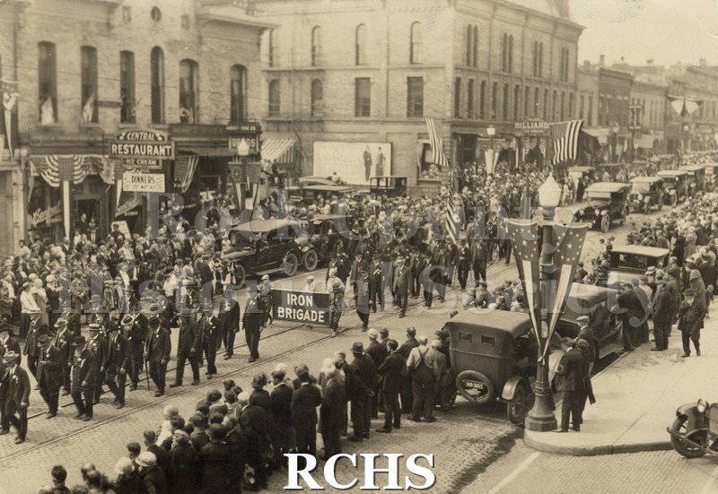 Historic image of Grand Army of the Republic (Civil War Veterans) Parade down Main Street in Janesville.