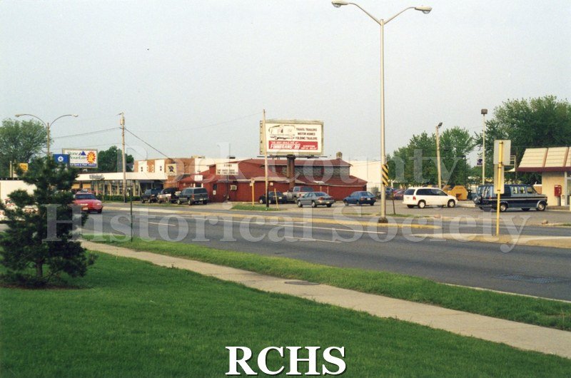Color photo of demolition of Slick's Bar, Milton Avenue. Bar owned by Dean Richards and Jim Comstock. Leased from Joe Adamany.