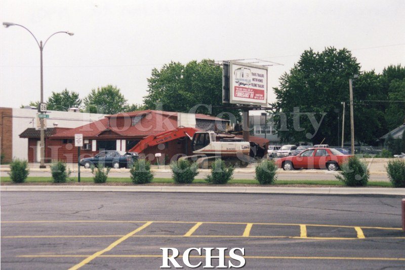 Color photo of demolition of Slick's Bar, Milton Avenue. Bar owned by Dean Richards and Jim Comstock. Leased from Joe Adamany. Similar to 2007.49.9.