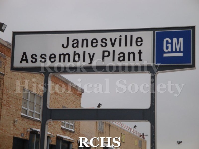 Digital Photograph- Sign outside of General Motors entrance, "Janesville Assembly Plant GM".
