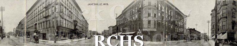 Historic image of Four section, black and white photographic print of downtown Janesville, WI.
