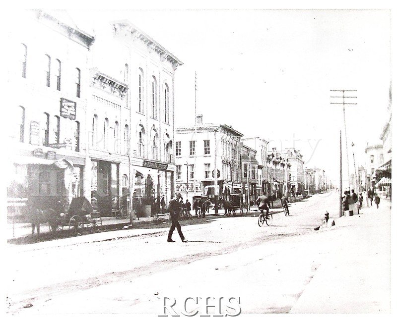 Black and white photograph of intersection of W.