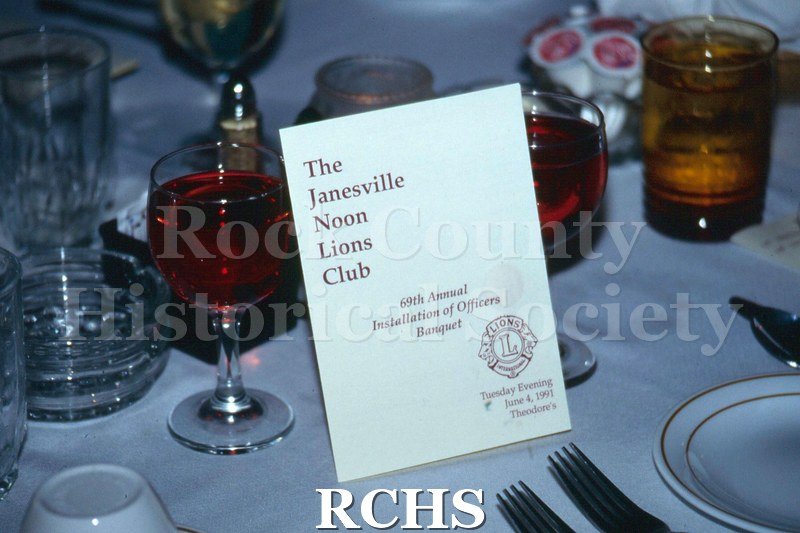 Color photo of a program for the Janesville Noon Lions Club Installaton of Officers Banquet.
