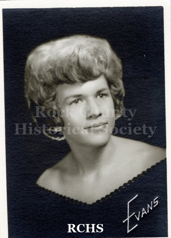 Black and white portrait of an unidentified young woman, Janesville High School graduate. Photo was from the personal collection of Bruce Bell, JHS class of 1965.