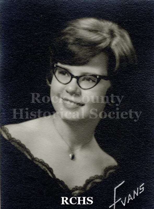 Black and white portrait of an unidentified young woman, Janesville High School graduate. Photo was from the personal collection of Bruce Bell, JHS class of 1965.