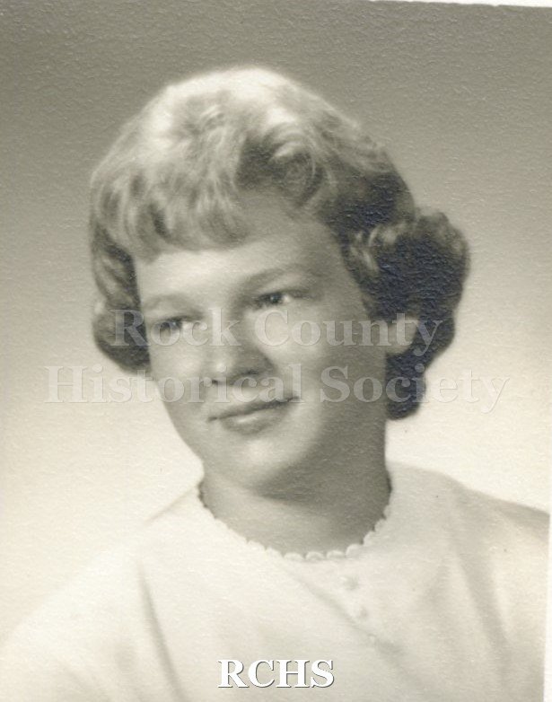 Black and white portrait of an unidentified young woman, Janesville High School graduate. Photo was from the personal collection of Bruce Bell, JHS class of 1965.