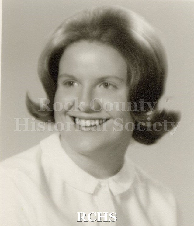 Black and white portrait of an unidentified young woman, Janesville High School graduate. Photo was from the personal collection of Bruce Bell, JHS class of 1965.