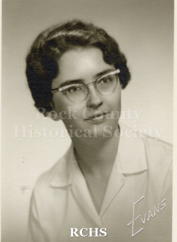 Black and white portrait of an unidentified young woman, Janesville High School graduate. Photo was from the personal collection of Bruce Bell, JHS class of 1965.