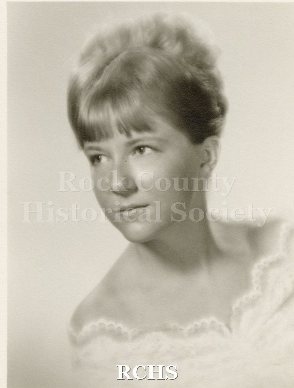 Black and white portrait of an unidentified young woman, Janesville High School graduate. Photo was from the personal collection of Bruce Bell, JHS class of 1965.
