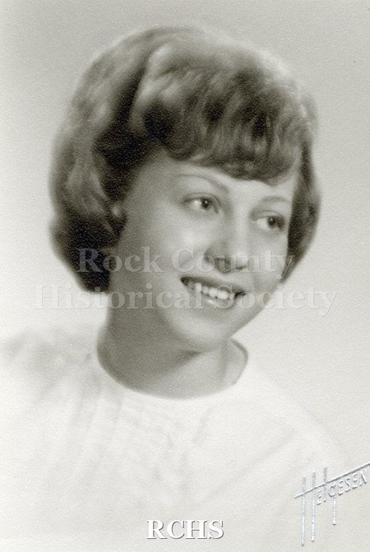 Black and white portrait of an unidentified young woman, Janesville High School graduate. Photo was from the personal collection of Bruce Bell, JHS class of 1965.