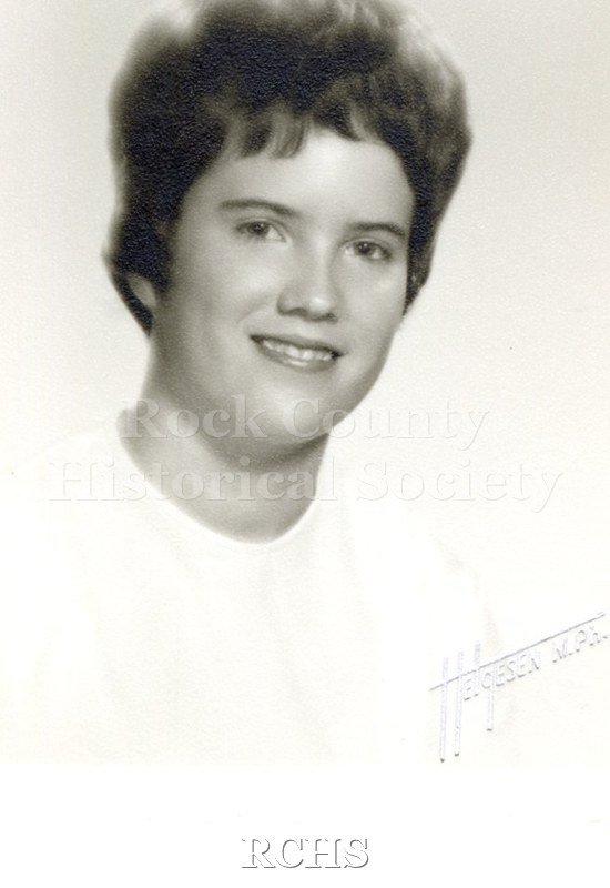 Black and white portrait of an unidentified young woman, Janesville High School graduate. Photo was from the personal collection of Bruce Bell, JHS class of 1965.